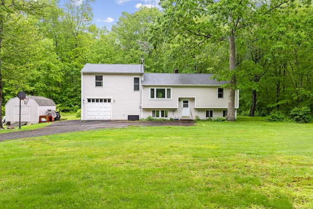 30 Cottage Rd, Bozrah, CT 06334 - split foyer home featuring a front lawn, driveway, a garage, roof with shingles, and a chimney