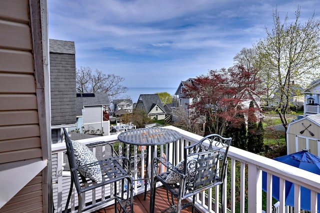 wooden deck with a residential view