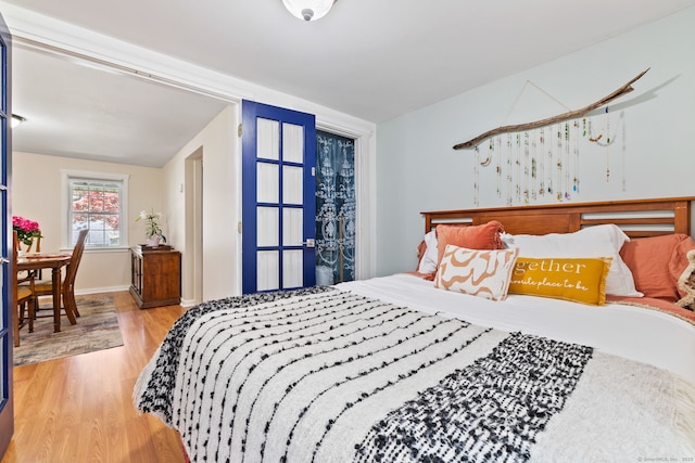 bedroom with wood finished floors