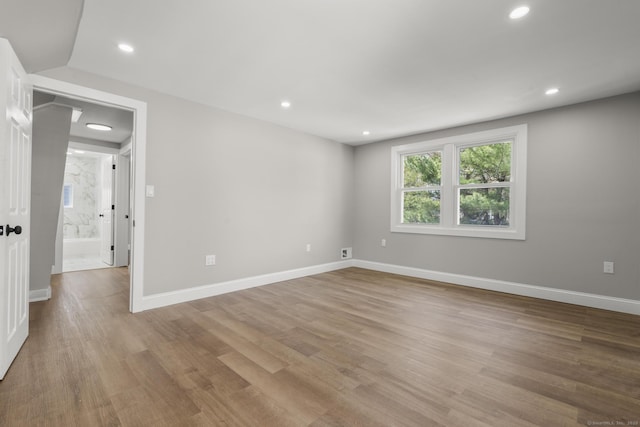 449 High St, Fairfield, CT 06824 - unfurnished room with baseboards, light wood-style floors, and recessed lighting