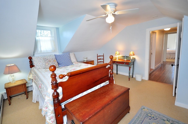 bedroom featuring baseboards, ceiling fan, carpet floors, and lofted ceiling