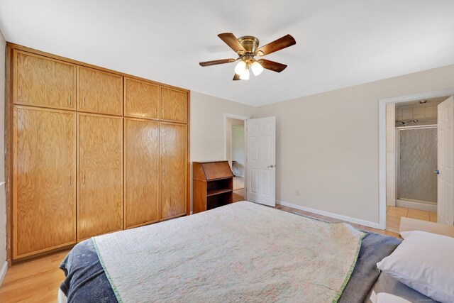 bedroom with baseboards, a ceiling fan, and light wood-style flooring