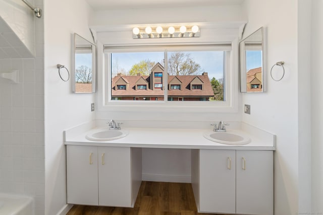 72 Montoya Dr Unit 72, Branford, CT 06405 - full bathroom featuring wood finished floors, a healthy amount of sunlight, and a sink