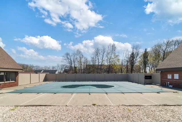 72 Montoya Dr Unit 72, Branford, CT 06405 - view of swimming pool with fence, a fenced in pool, and a patio