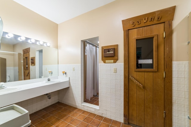 72 Montoya Dr Unit 72, Branford, CT 06405 - full bathroom featuring wainscoting, a stall shower, tile patterned flooring, and tile walls