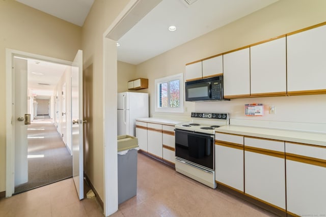 72 Montoya Dr Unit 72, Branford, CT 06405 - kitchen featuring white cabinets, white appliances, and light countertops
