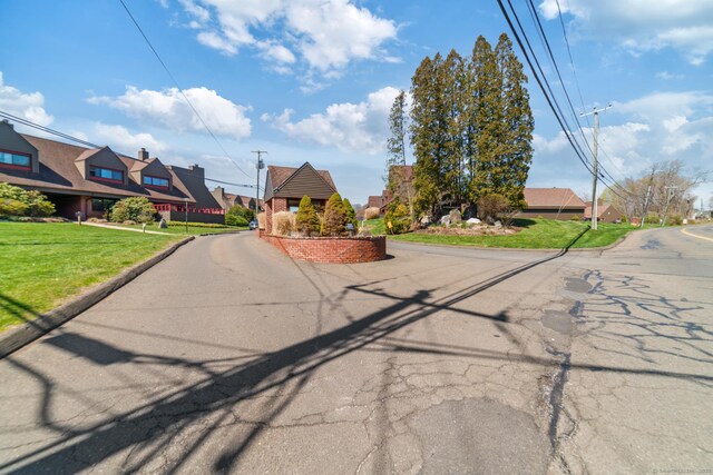 72 Montoya Dr Unit 72, Branford, CT 06405 - view of road with curbs and a residential view