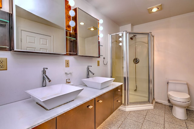472 Westover Rd, Stamford, CT 06902 - bathroom featuring a shower stall, toilet, and a sink