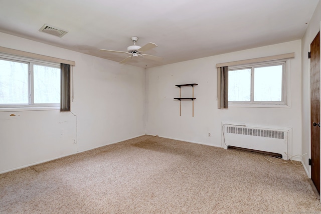 472 Westover Rd, Stamford, CT 06902 - carpeted spare room with a ceiling fan, baseboards, radiator heating unit, and visible vents