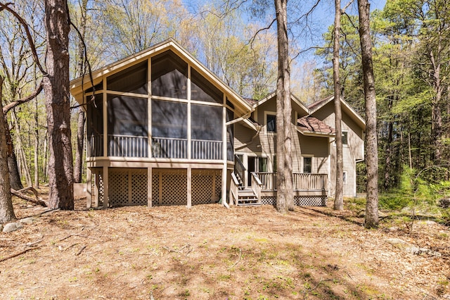 9 Stonehedge Way, Granby, CT 06060 - view of front of home featuring a wooden deck and a sunroom