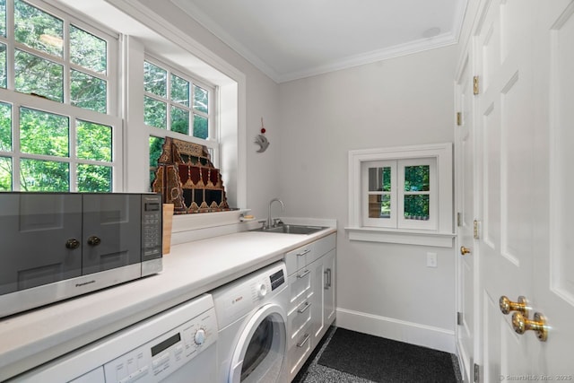66 Hedlund Rd, East Haddam, CT 06423 - laundry room with cabinet space, washing machine and clothes dryer, ornamental molding, plenty of natural light, and baseboards