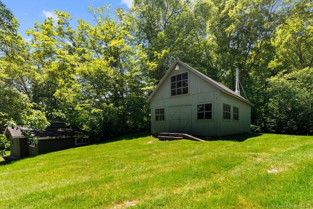 66 Hedlund Rd, East Haddam, CT 06423 - view of side of property featuring a lawn and an outdoor structure