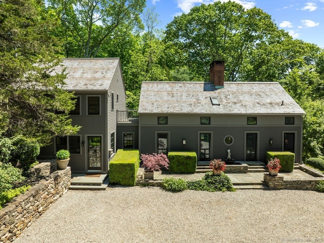 66 Hedlund Rd, East Haddam, CT 06423 - back of property with a chimney
