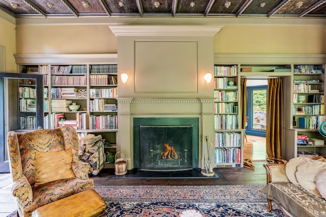 66 Hedlund Rd, East Haddam, CT 06423 - sitting room featuring wood-type flooring and a lit fireplace