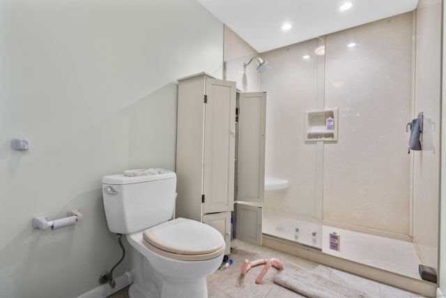 full bathroom featuring tile patterned floors, toilet, recessed lighting, and a stall shower