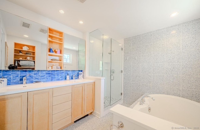 full bathroom featuring recessed lighting, a shower stall, speckled floor, a bath, and visible vents
