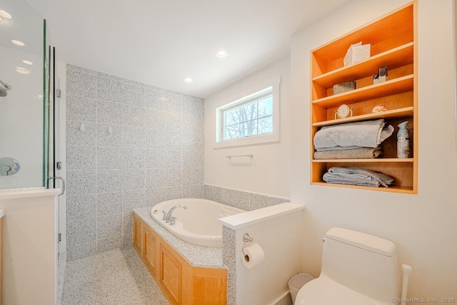 full bathroom featuring recessed lighting, a stall shower, toilet, and a garden tub