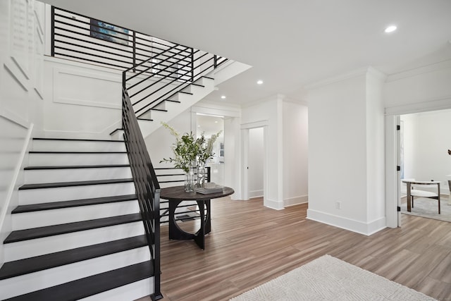 433 Belden Hill Rd, Wilton, CT 06897 - staircase with ornamental molding, wood finished floors, recessed lighting, and baseboards