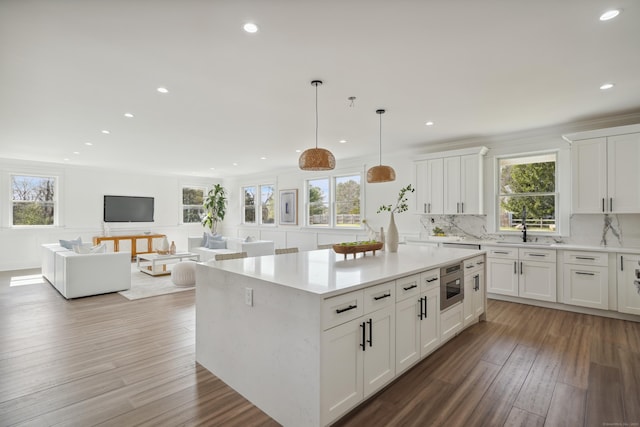 433 Belden Hill Rd, Wilton, CT 06897 - kitchen featuring light countertops, recessed lighting, plenty of natural light, and white cabinets
