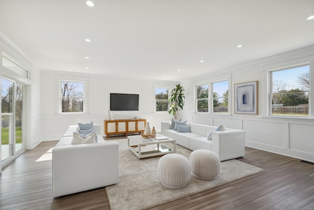 433 Belden Hill Rd, Wilton, CT 06897 - living room featuring ornamental molding, a decorative wall, wood finished floors, recessed lighting, and wainscoting
