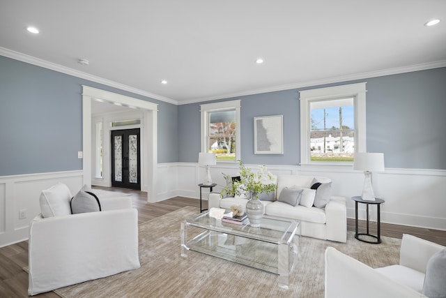433 Belden Hill Rd, Wilton, CT 06897 - living room with a wainscoted wall, crown molding, wood finished floors, recessed lighting, and french doors