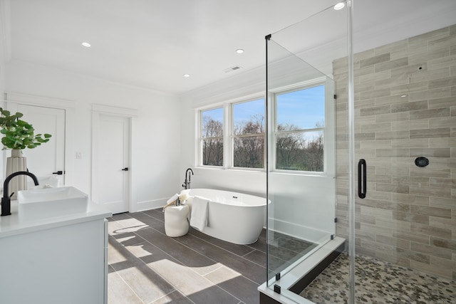 433 Belden Hill Rd, Wilton, CT 06897 - full bath with a shower stall, a soaking tub, vanity, baseboards, and recessed lighting
