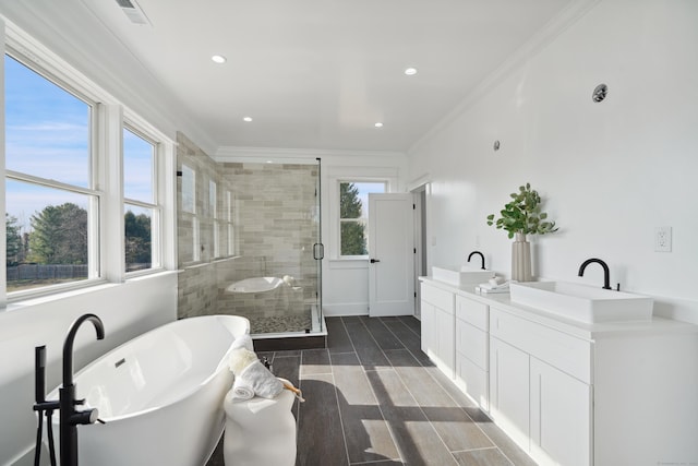433 Belden Hill Rd, Wilton, CT 06897 - full bathroom with a stall shower, crown molding, a freestanding tub, double vanity, and recessed lighting
