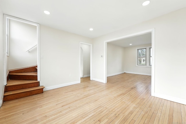 576 Main St, Somers, CT 06071 - unfurnished living room with stairway, light wood-style floors, recessed lighting, and baseboards