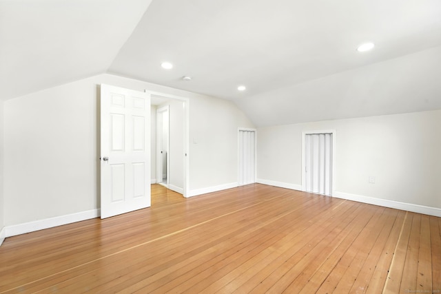 576 Main St, Somers, CT 06071 - bonus room with recessed lighting, baseboards, vaulted ceiling, and light wood-style floors