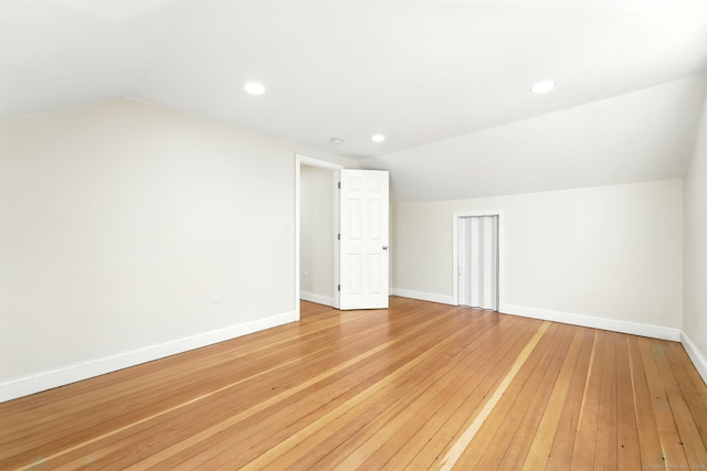 576 Main St, Somers, CT 06071 - additional living space with recessed lighting, baseboards, vaulted ceiling, and light wood-type flooring