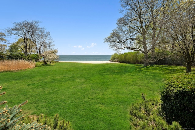 86 Wallacks Dr, Stamford, CT 06902 - view of grassy yard with view of water and beach