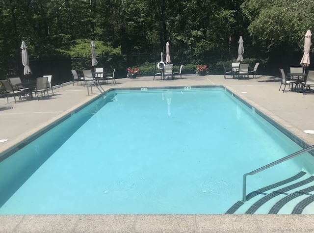 75 Brittania Rd Unit 75, Danbury, CT 06811 - pool featuring a patio and fence