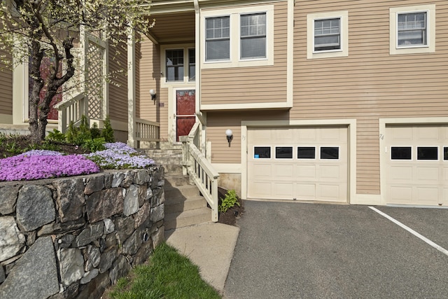 75 Brittania Rd Unit 75, Danbury, CT 06811 - view of front of property with a garage and driveway