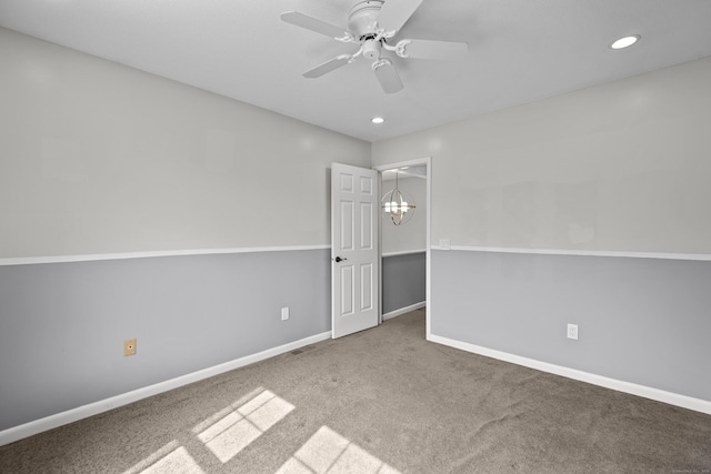 75 Brittania Rd Unit 75, Danbury, CT 06811 - spare room with baseboards, carpet, ceiling fan with notable chandelier, and recessed lighting
