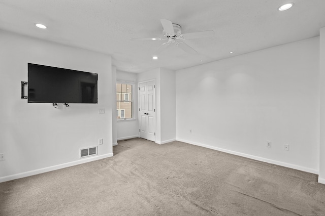 75 Brittania Rd Unit 75, Danbury, CT 06811 - unfurnished living room featuring visible vents, baseboards, recessed lighting, a ceiling fan, and carpet
