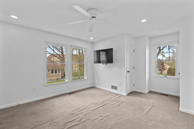 75 Brittania Rd Unit 75, Danbury, CT 06811 - unfurnished living room with visible vents, carpet flooring, baseboards, and recessed lighting