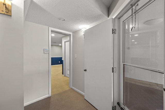 75 Brittania Rd Unit 75, Danbury, CT 06811 - hall featuring baseboards, light colored carpet, a textured ceiling, and visible vents