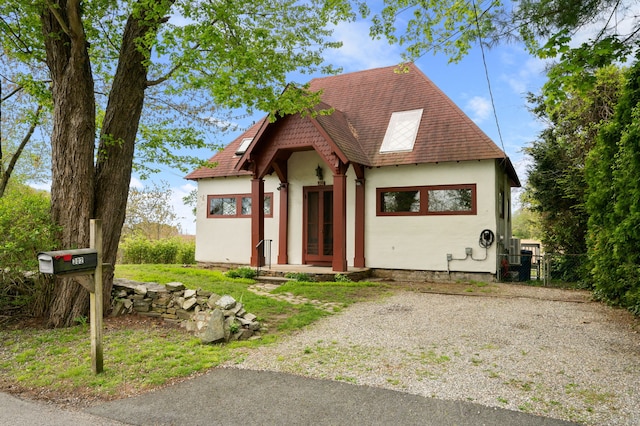 302 Ferry Rd, Old Lyme, CT 06371 - view of front of property featuring stucco siding and roof with shingles