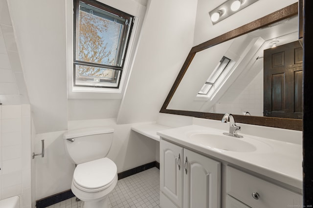 302 Ferry Rd, Old Lyme, CT 06371 - bathroom with healthy amount of natural light, toilet, tile patterned floors, and vanity