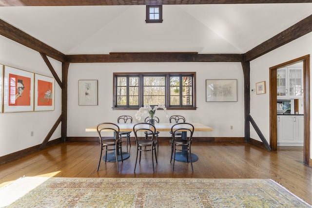 55-69 Sawmill Rd, Branford, CT 06405 - dining area with hardwood / wood-style floors, baseboards, and lofted ceiling