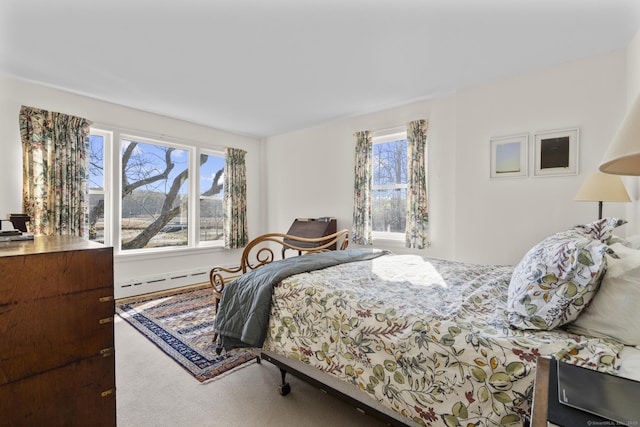 55-69 Sawmill Rd, Branford, CT 06405 - carpeted bedroom with baseboard heating and multiple windows