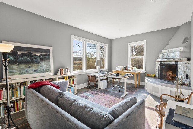 55-69 Sawmill Rd, Branford, CT 06405 - living area featuring baseboards and a fireplace