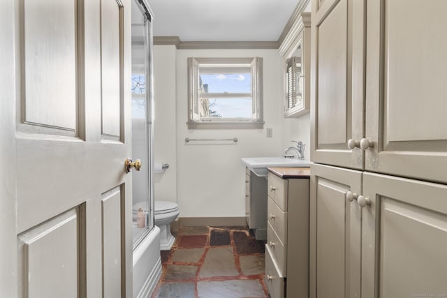 55-69 Sawmill Rd, Branford, CT 06405 - bathroom with toilet, stone finish floor, vanity, and baseboards
