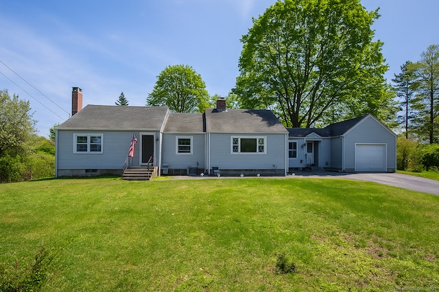 single story home featuring a chimney, a front yard, aphalt driveway, and a garage