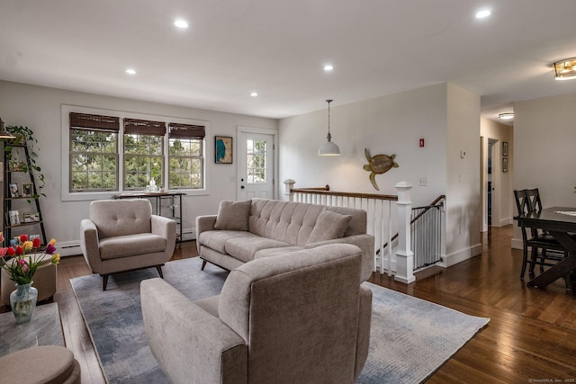 living area featuring baseboards, baseboard heating, recessed lighting, and dark wood-type flooring