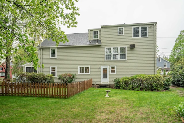 20 Fairview St, Simsbury, CT 06070 - rear view of property featuring a lawn and fence