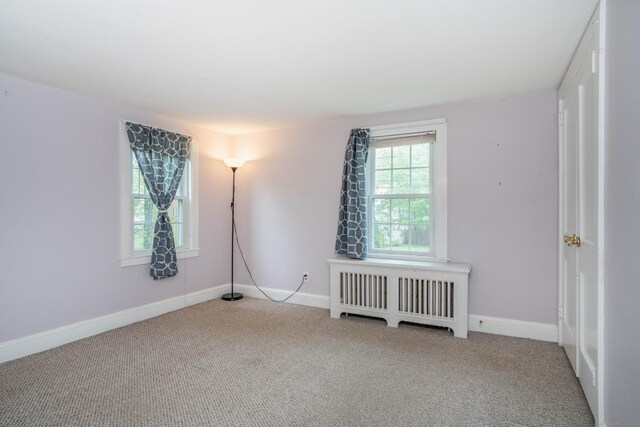 20 Fairview St, Simsbury, CT 06070 - unfurnished room with radiator, baseboards, and carpet flooring