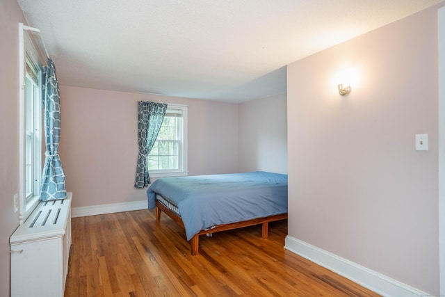 20 Fairview St, Simsbury, CT 06070 - bedroom with light wood finished floors and baseboards
