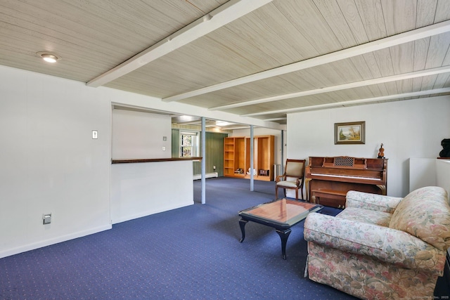 carpeted living area with baseboards and beam ceiling