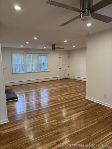 71 Schiller Rd, Fairfield, CT 06825 - spare room featuring a baseboard heating unit, a wealth of natural light, a ceiling fan, and recessed lighting